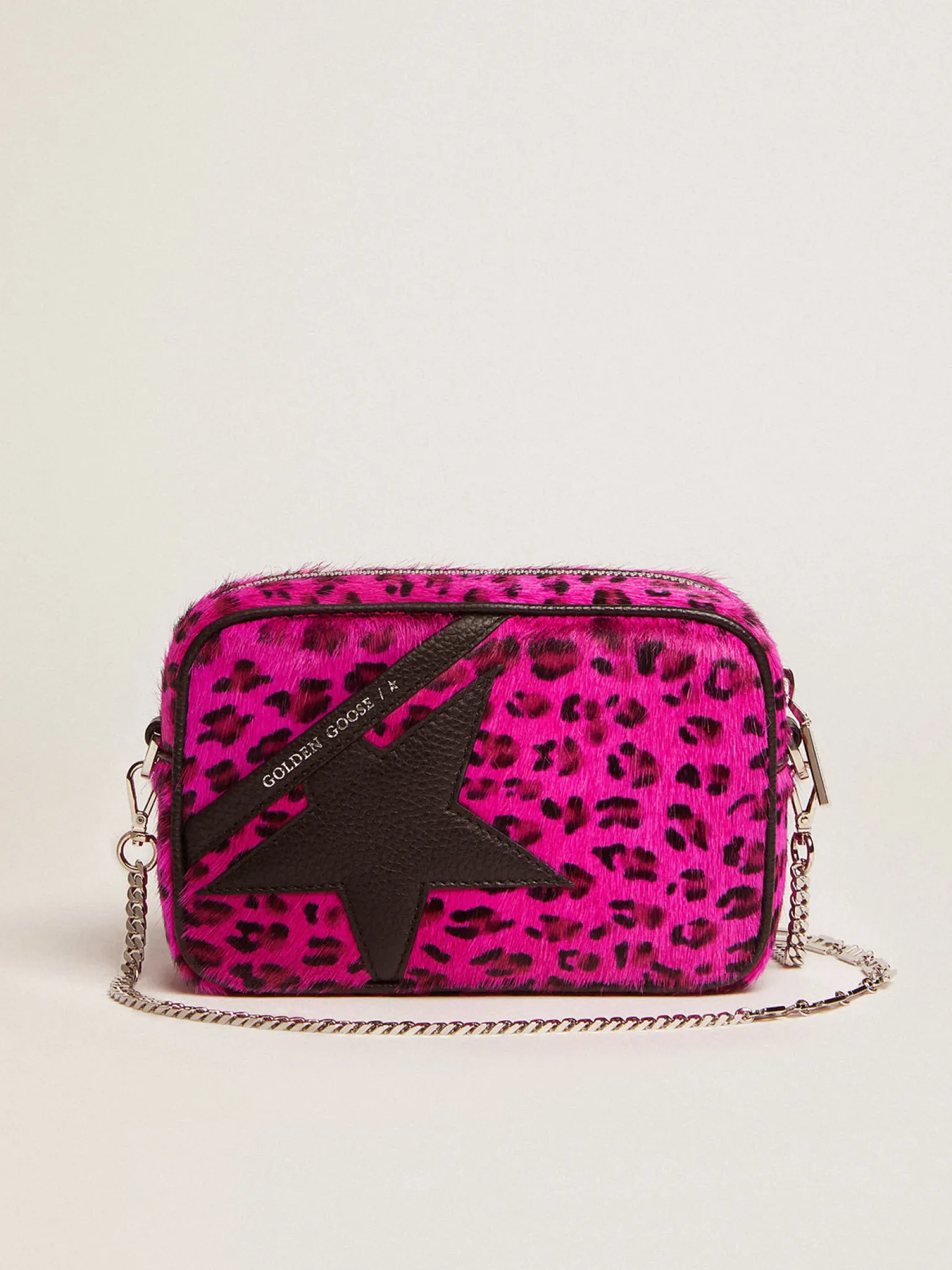 Shop Bolsa Mini Star de couro cavalinho com estampa de leopardo fúcsia e estrela de couro preta MULHER Minibolsas | Bolsas tiracolo