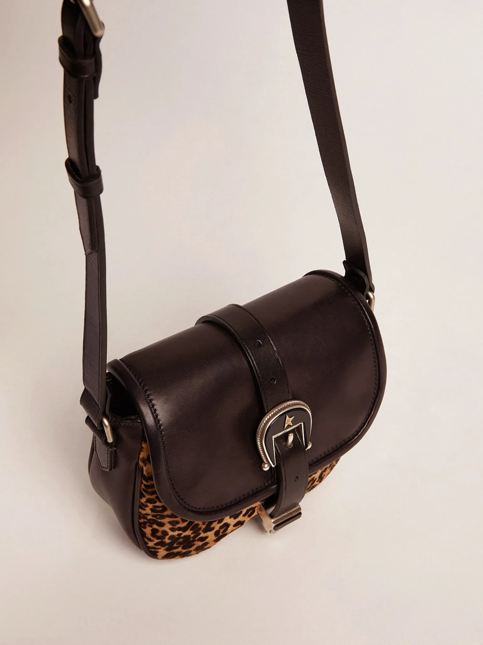 Store Bolsa Rodeo pequena de couro preto e couro cavalinho com estampa de leopardo MULHER Bolsas tiracolo
