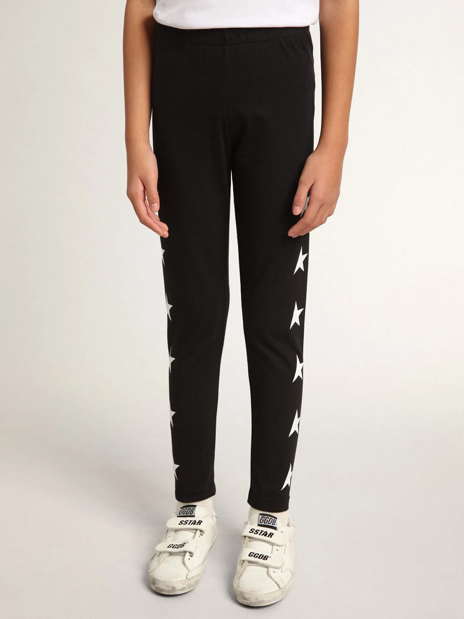 Store Calça de legging infantil feminina preta com estrelas brancas nas laterais Bottoms (4-12 years) | Bottoms (4-12 years)