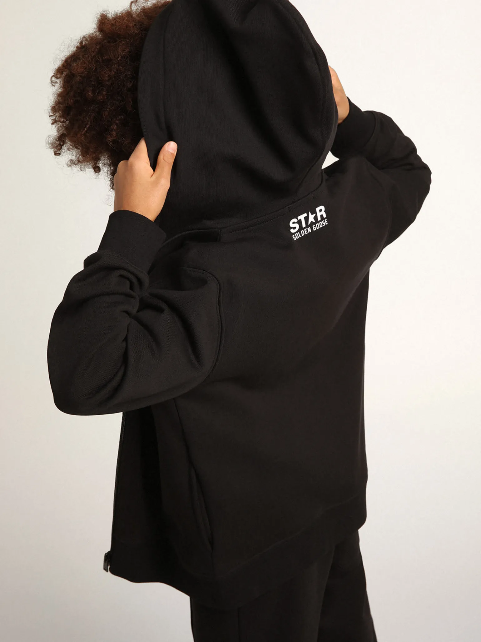 Best Moletom preto com capuz e estrela e logo brancos em contraste Roupas de cima (4-12 years) | Roupas de cima (4-12 years)