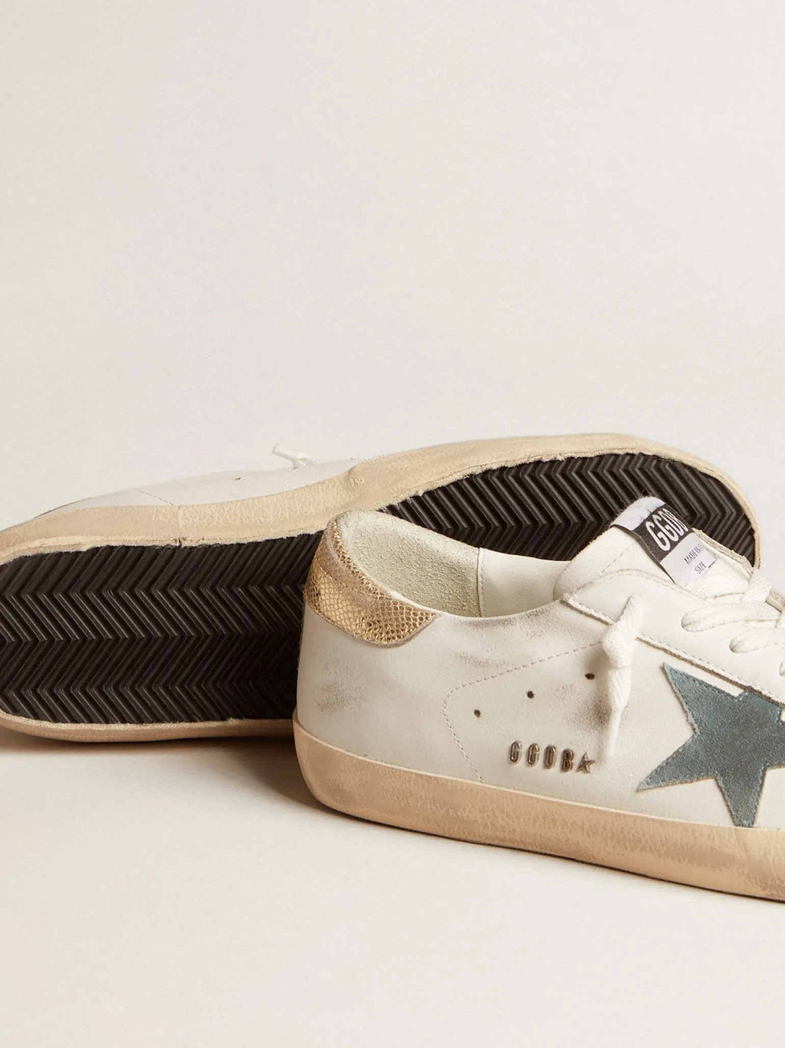 Best Sale Super-Star com estrela de suede e talão de couro estampa de píton platinado Super-Star