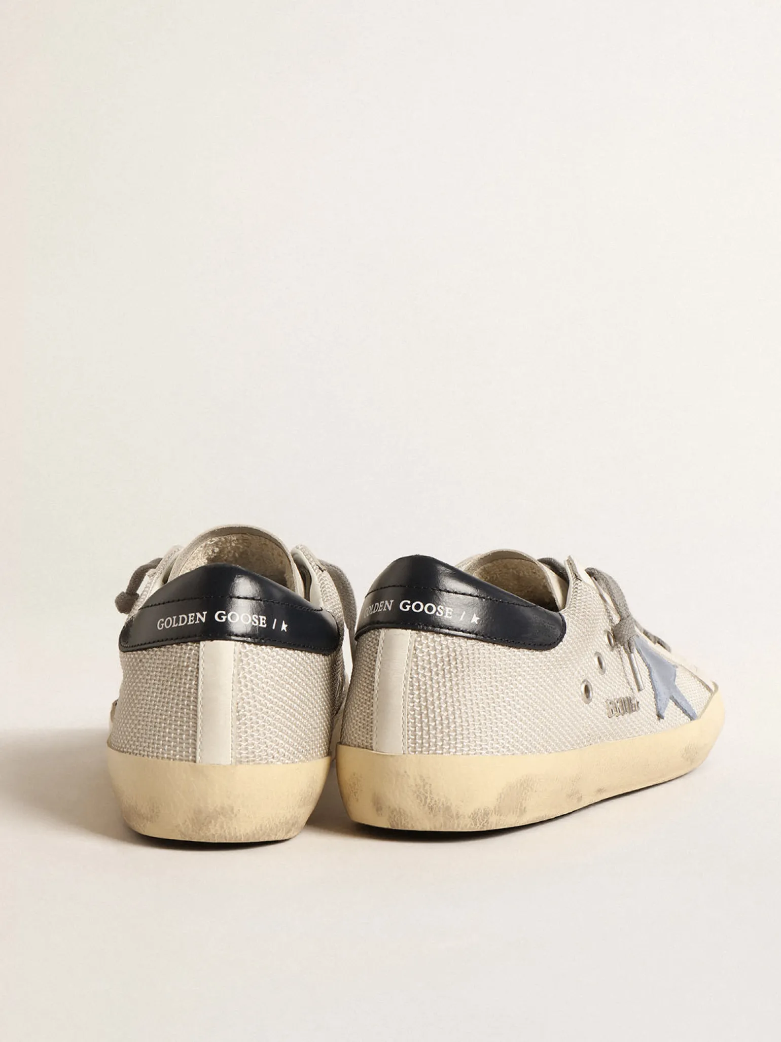 Clearance Super-Star de tela prateada clara com estrela de suede azul Super-Star
