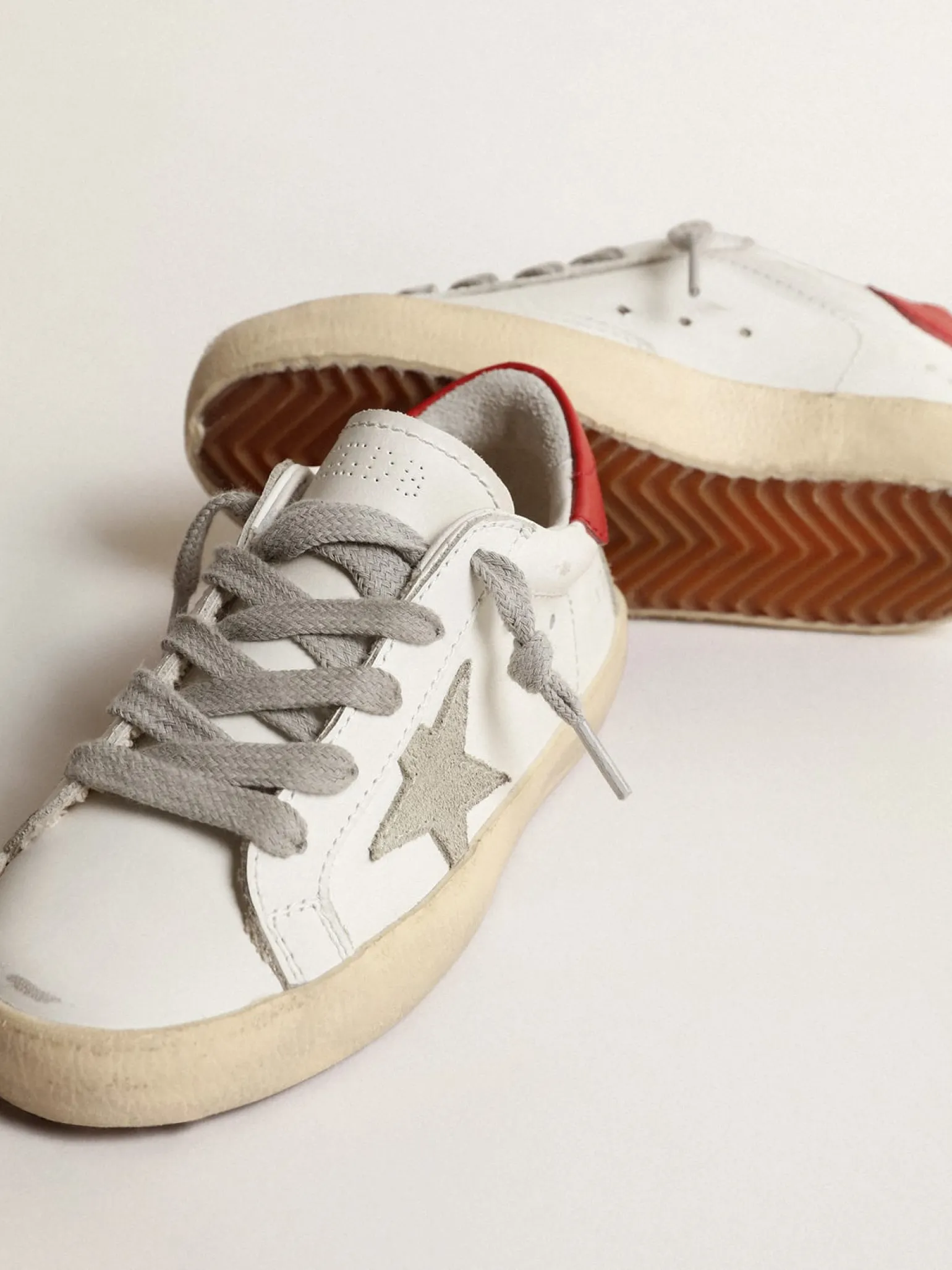 Clearance Super-Star Junior com estrela de suede e talão de couro vermelho Meninas pequenas (1-3 anos) | Meninos pequenos (1-3 anos)