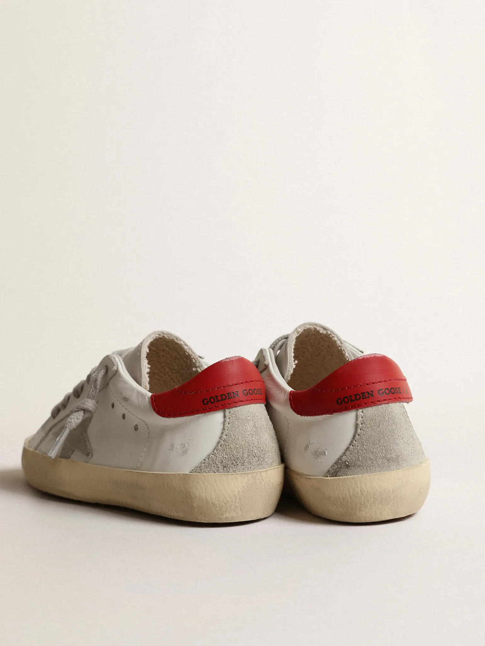 Clearance Super-Star Junior com estrela de suede e talão de couro vermelho Meninas pequenas (1-3 anos) | Meninos pequenos (1-3 anos)